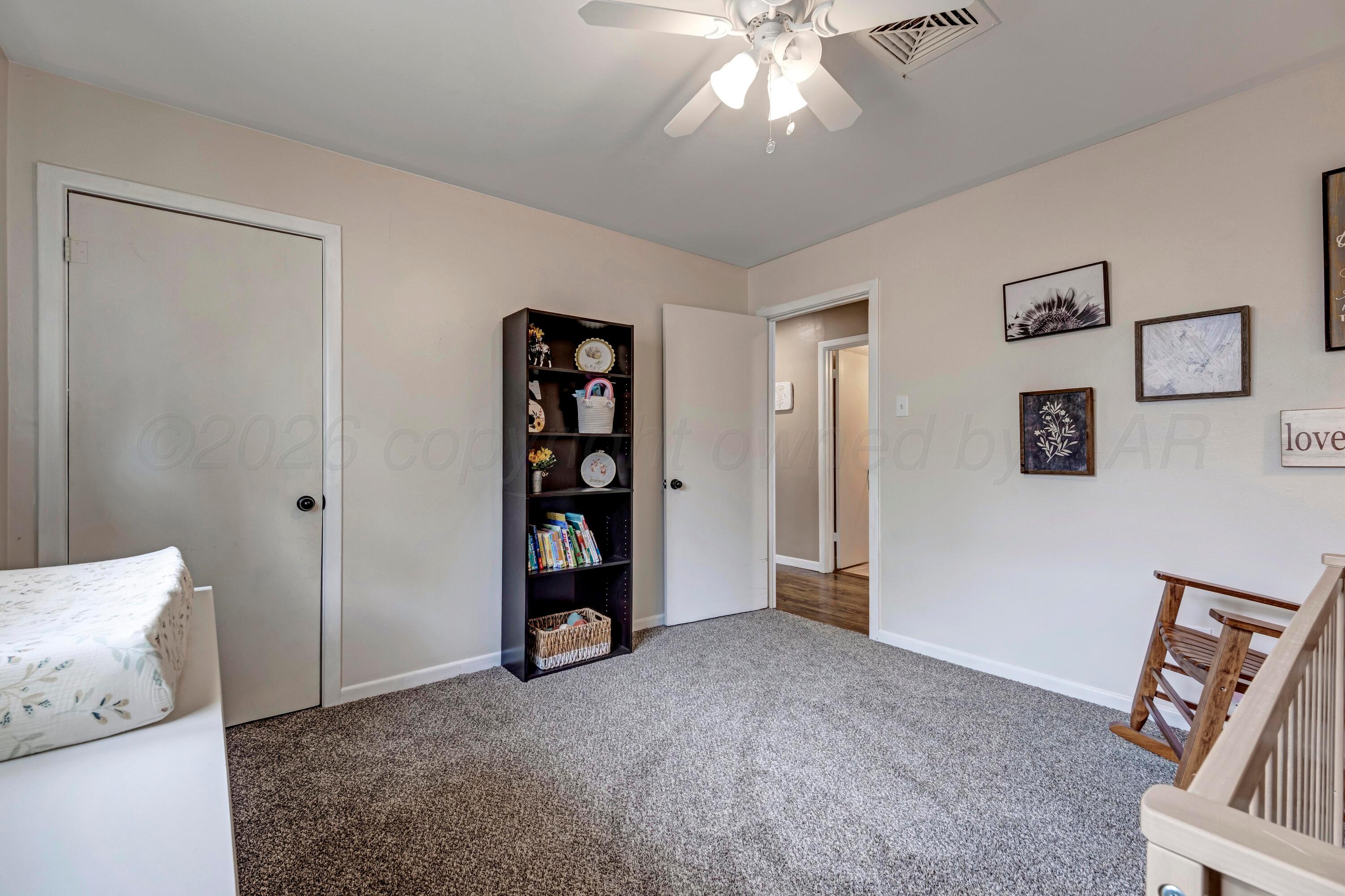 212 Teague Street Borger, TX 79007 - Photo 16 of 30 a view of an empty room with a window