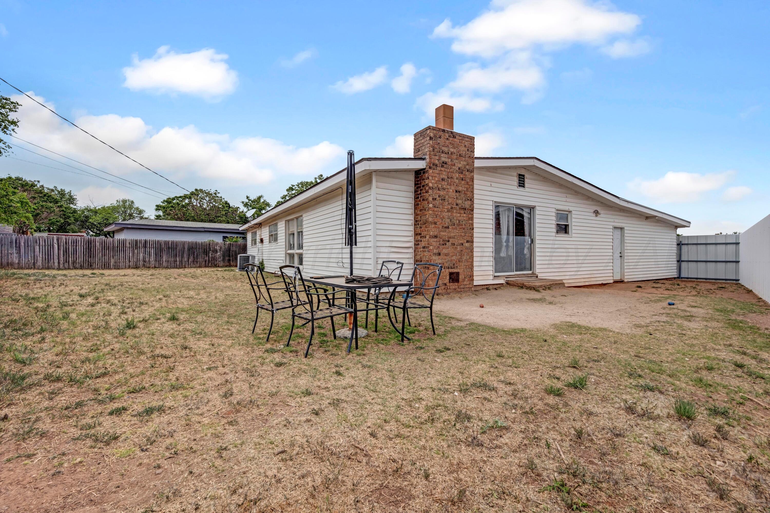 212 Teague Street Borger, TX 79007 - Photo 24 of 30 a view of a house with backyard and sitting area