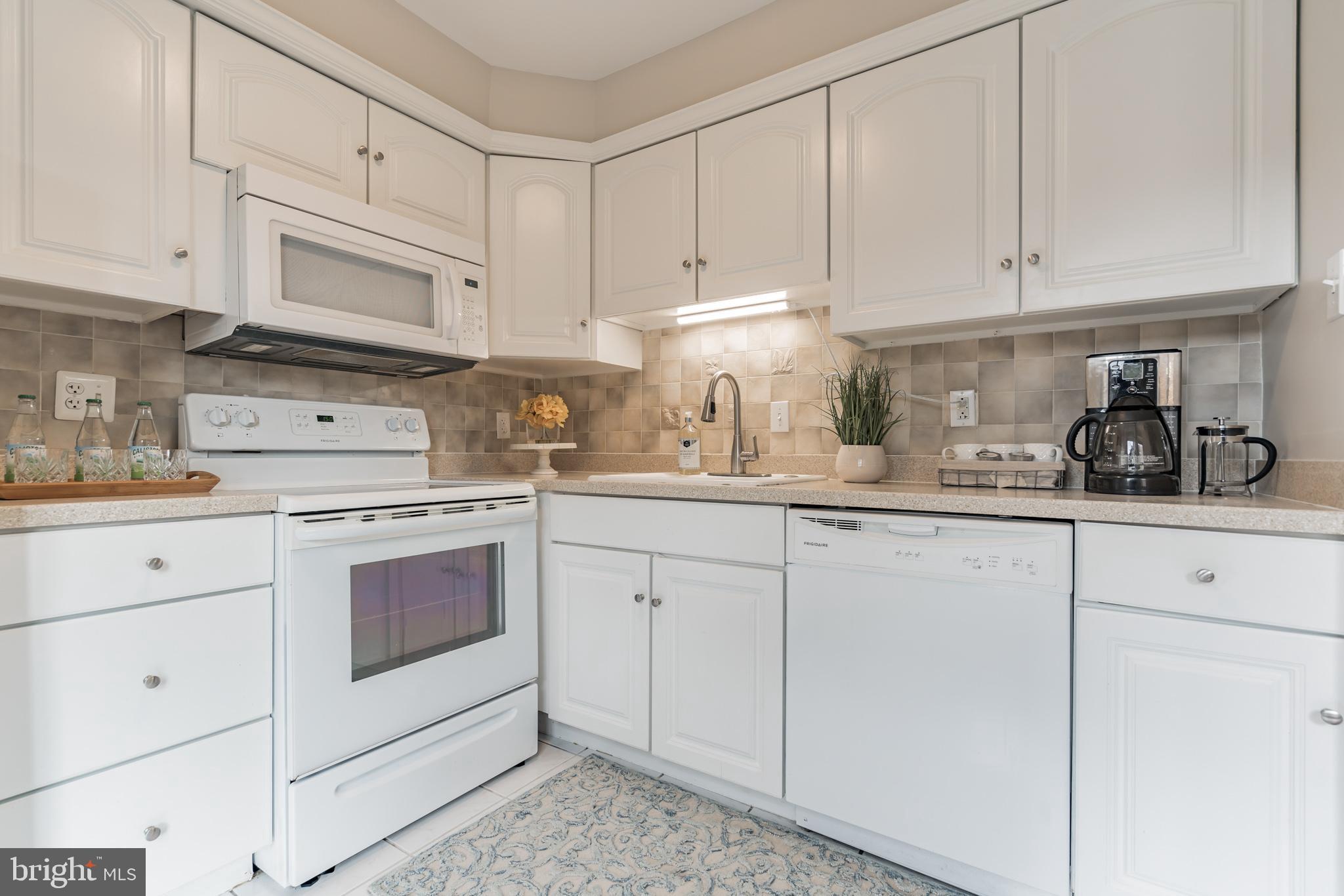 3212 Spartan Road, Unit 30 Olney, MD 20832 - Photo 18 of 40 White on white stylish kitchen