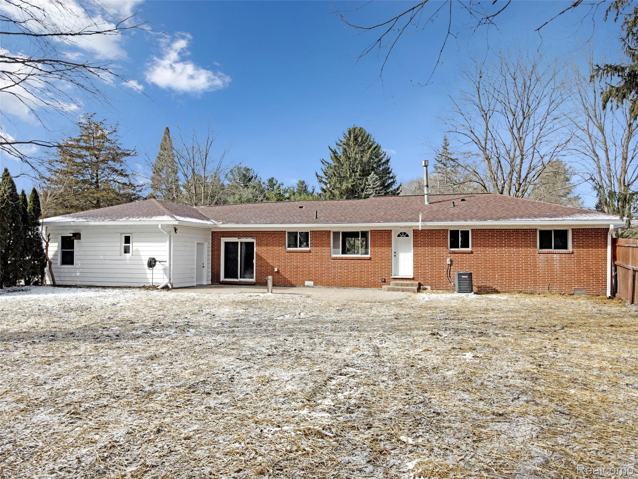 13515 Lenmoore Road Belleville, MI 48111 - Photo 35 of 41 Back of house featuring brick siding and entry steps