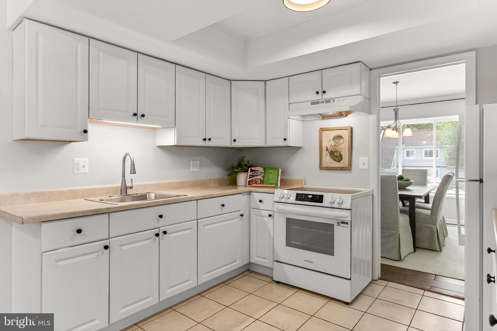 1498 Roundleaf Court Reston, VA 20190 - Photo 16 of 62 NEW range and light over the NEW sink + Faucet