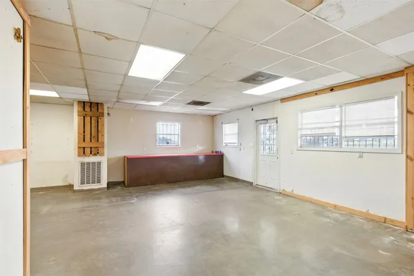 an empty room with windows