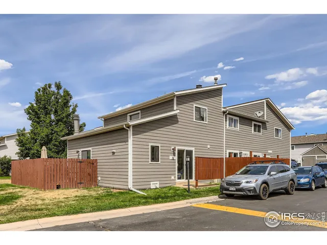 a car parked in front of a house