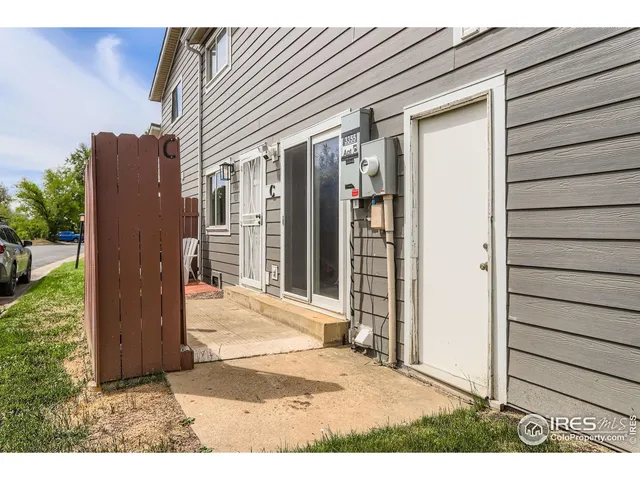 a view of a house with a wooden door