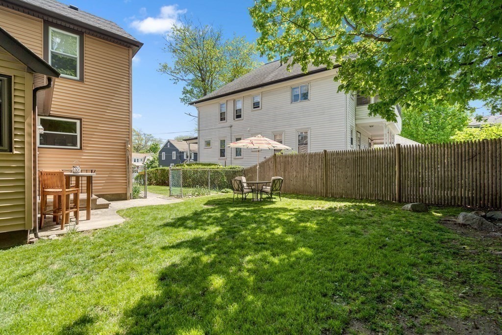 61 Waldeck Road Milton, MA 02186 - Photo 28 of 31 a view of a backyard with a garden