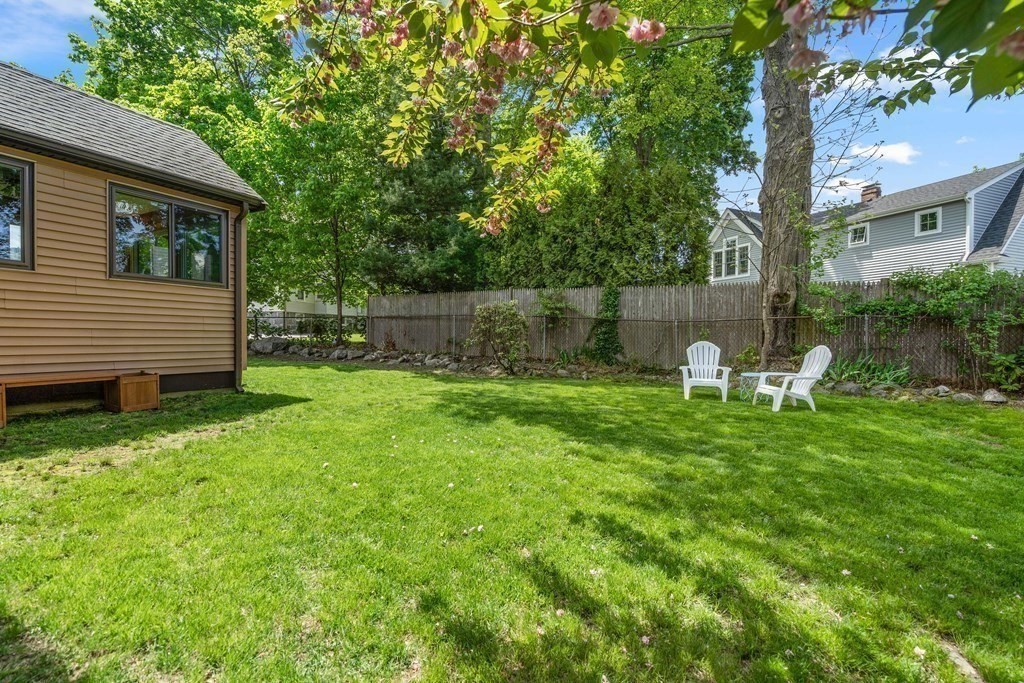 61 Waldeck Road Milton, MA 02186 - Photo 29 of 31 a backyard of a house with lots of green space