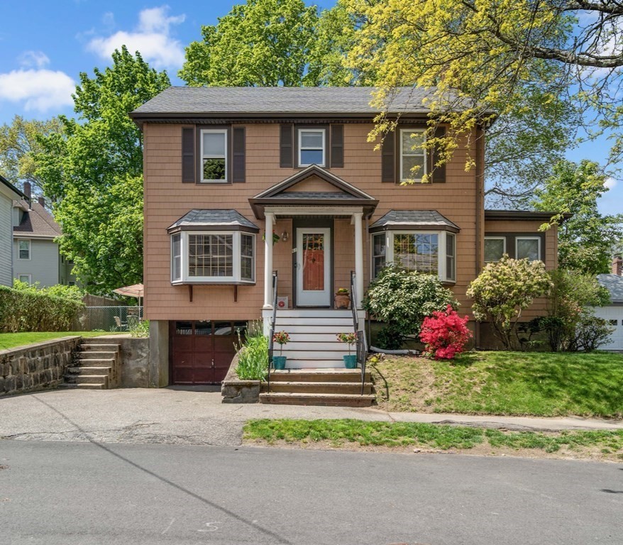 61 Waldeck Road Milton, MA 02186 - Photo 31 of 31 a front view of a house with a garden