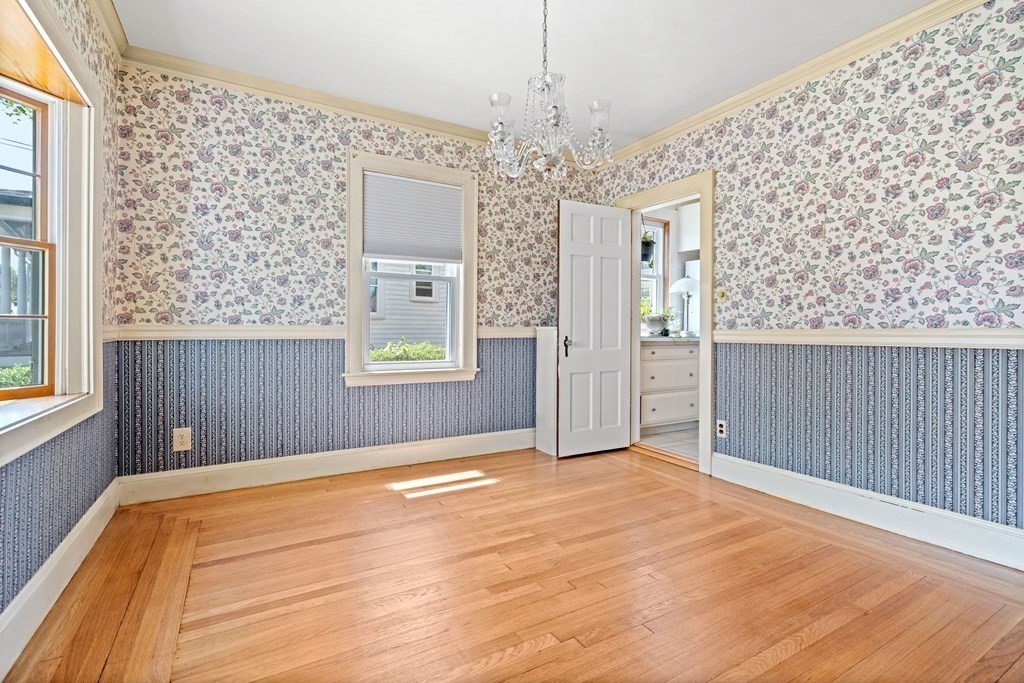 61 Waldeck Road Milton, MA 02186 - Photo 8 of 31 a view of an empty room with a window