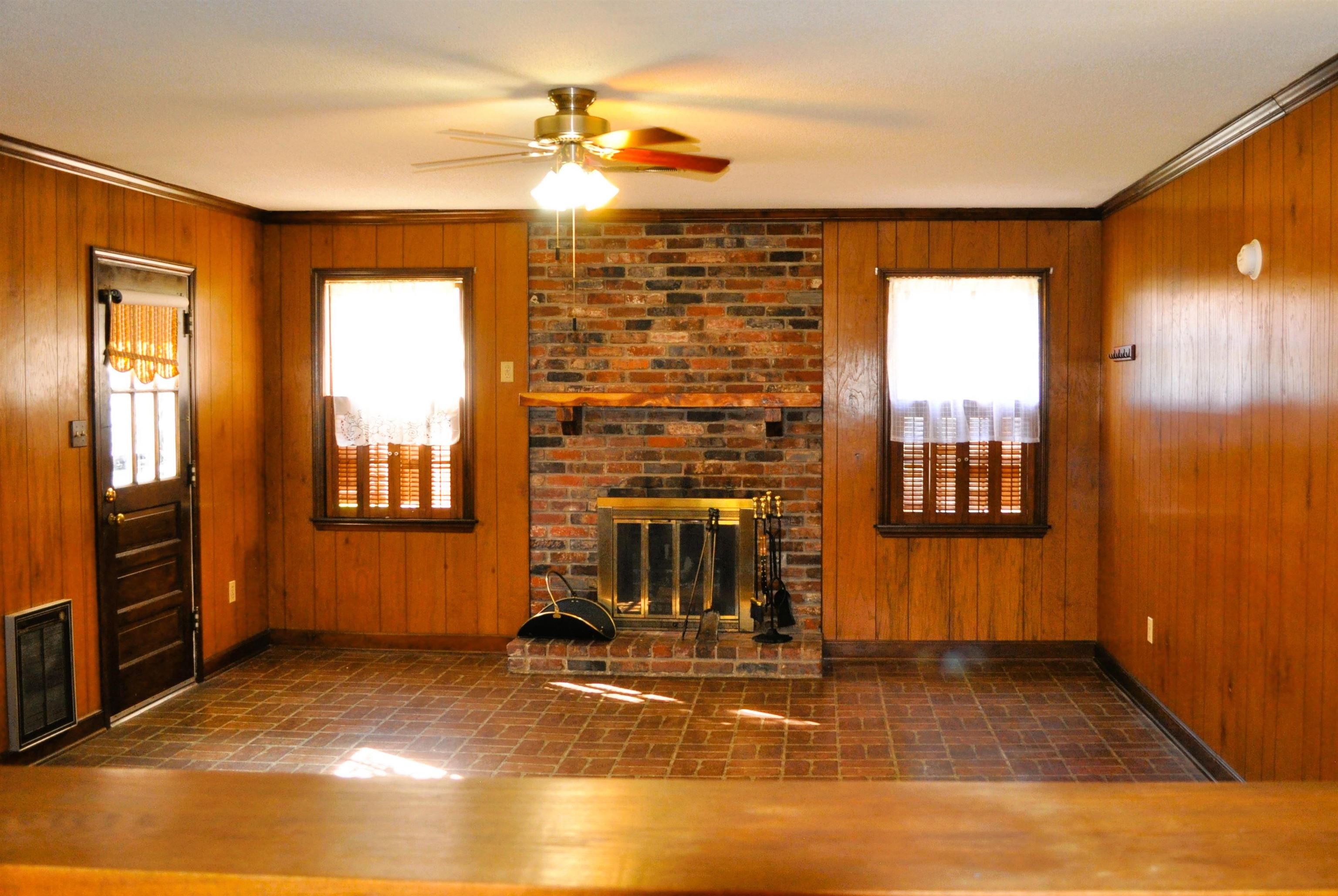 1263 South Perkins Road Memphis, TN 38117 - Photo 18 of 35 a living room with fireplace furniture and a window