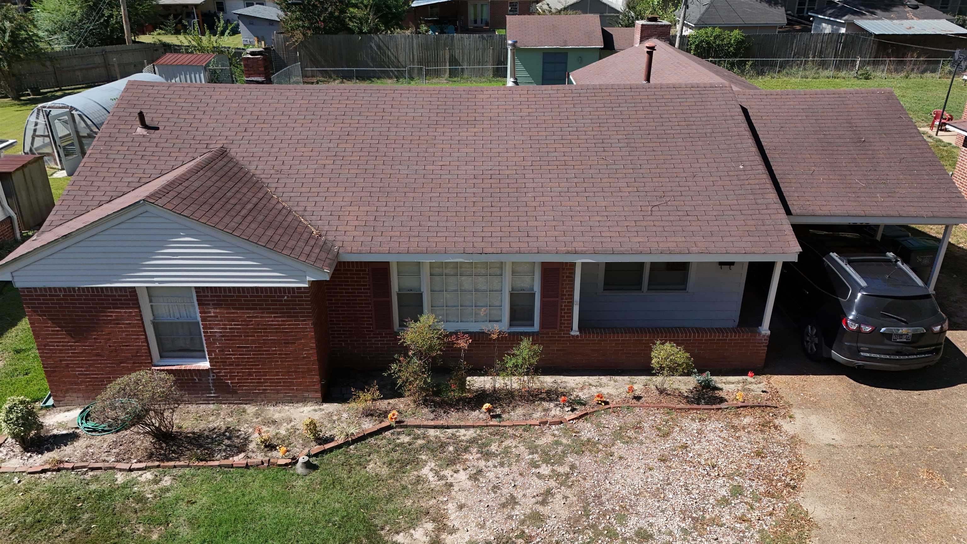 1263 South Perkins Road Memphis, TN 38117 - Photo 5 of 35 a front view of a house with a yard and garage