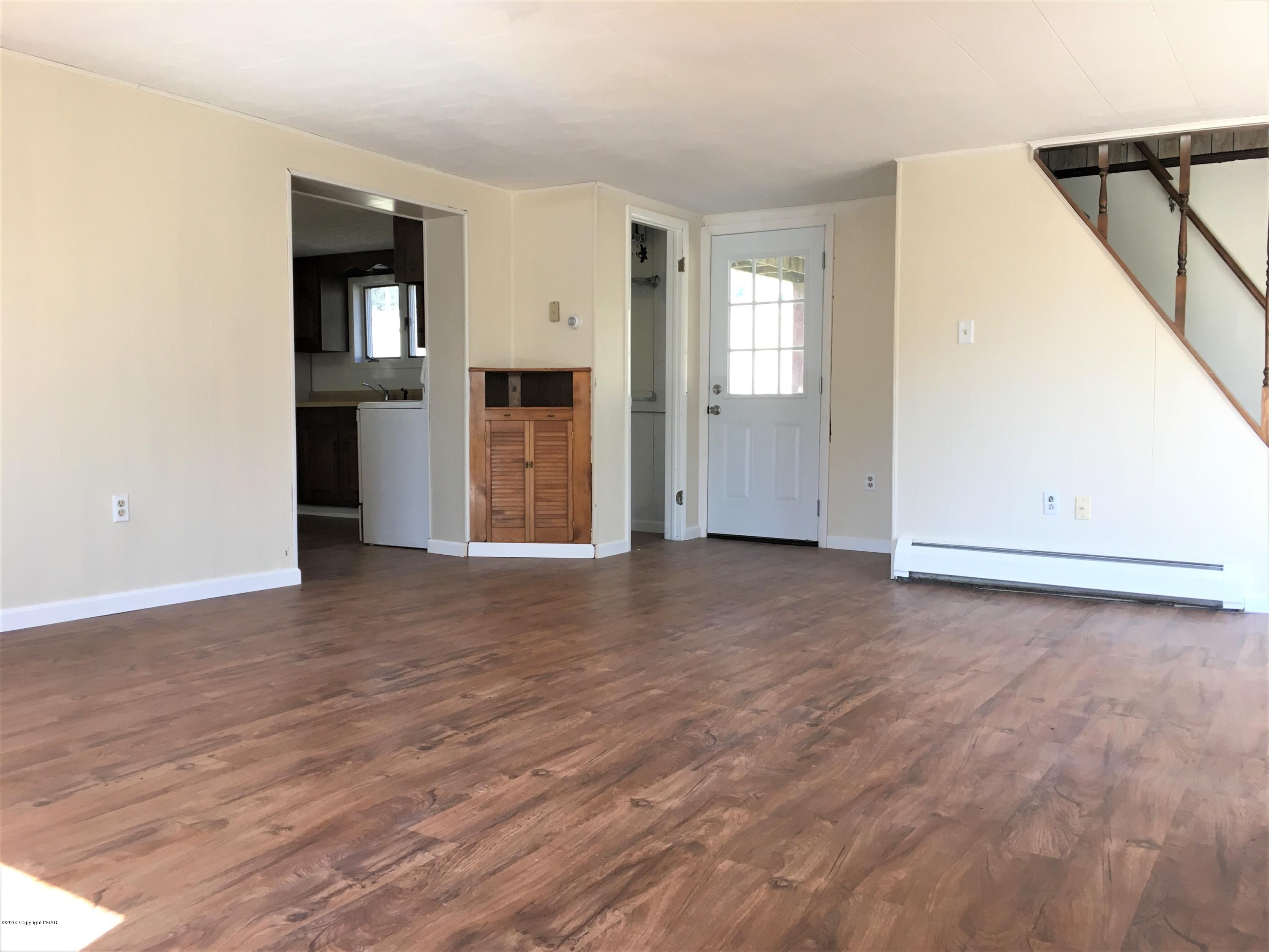 5736 Neola Road Stroudsburg, PA 18360 - Photo 15 of 37 an empty room with closet and windows