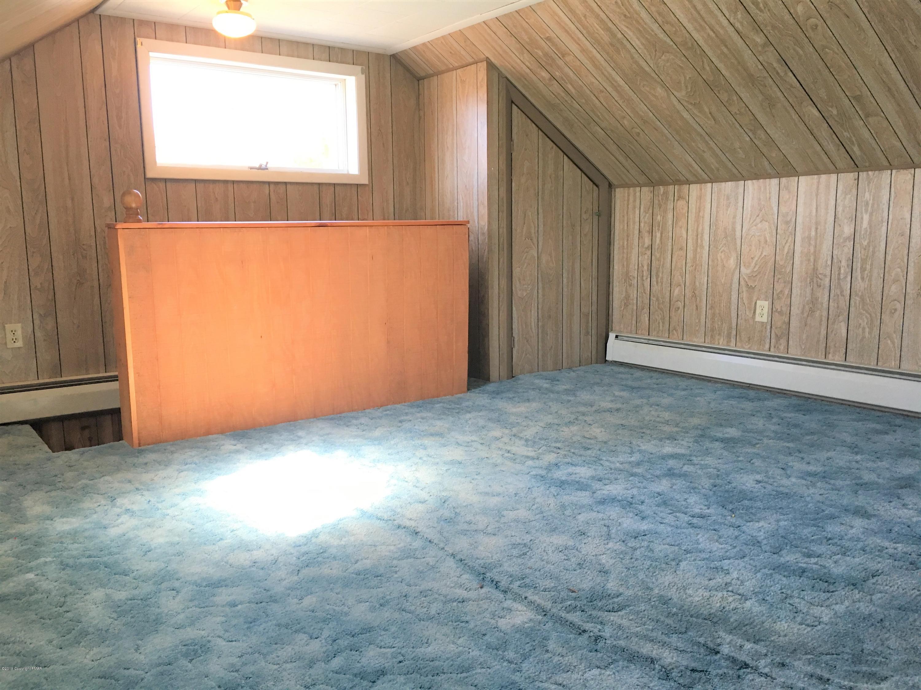 5736 Neola Road Stroudsburg, PA 18360 - Photo 22 of 37 an empty room with windows