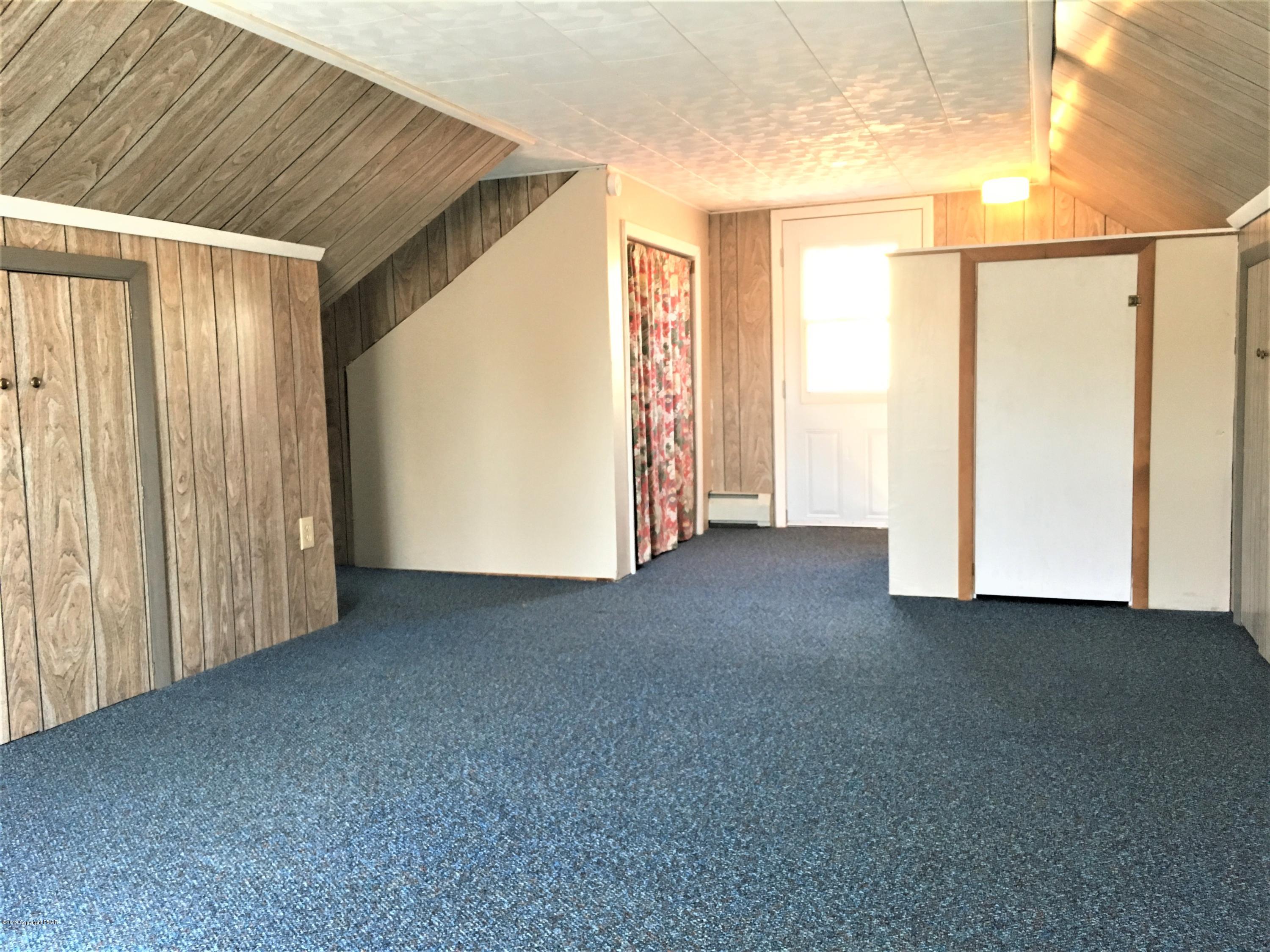 5736 Neola Road Stroudsburg, PA 18360 - Photo 24 of 37 a view of empty room with windows