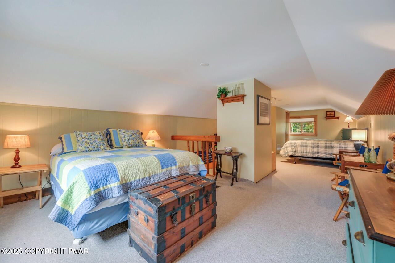 229 3rd Street Pocono Pines, PA 18350 - Photo 14 of 21 a bedroom with two beds and next to a window