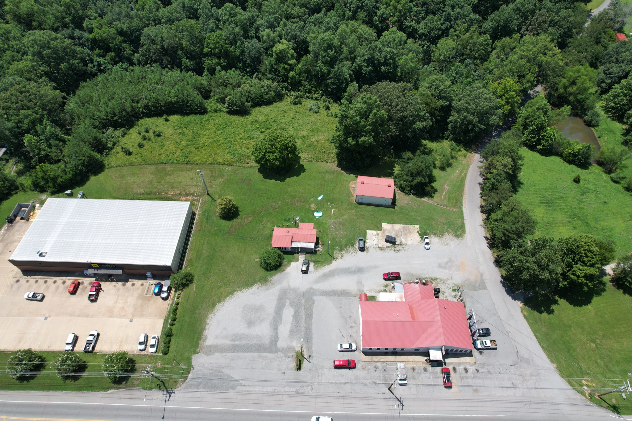 1331 Highway 100 Centerville, TN 37033 - Photo 4 of 26 an aerial view of a house with outdoor space swimming pool and outdoor seating