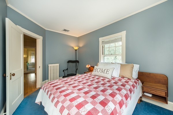 20 Symmes Road Winchester, MA 01890 - Photo 17 of 26 a bedroom with a bed and a large window