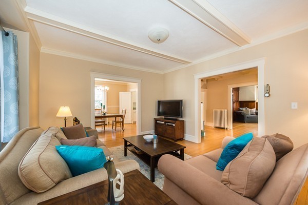 20 Symmes Road Winchester, MA 01890 - Photo 6 of 26 a living room with furniture and a flat screen tv