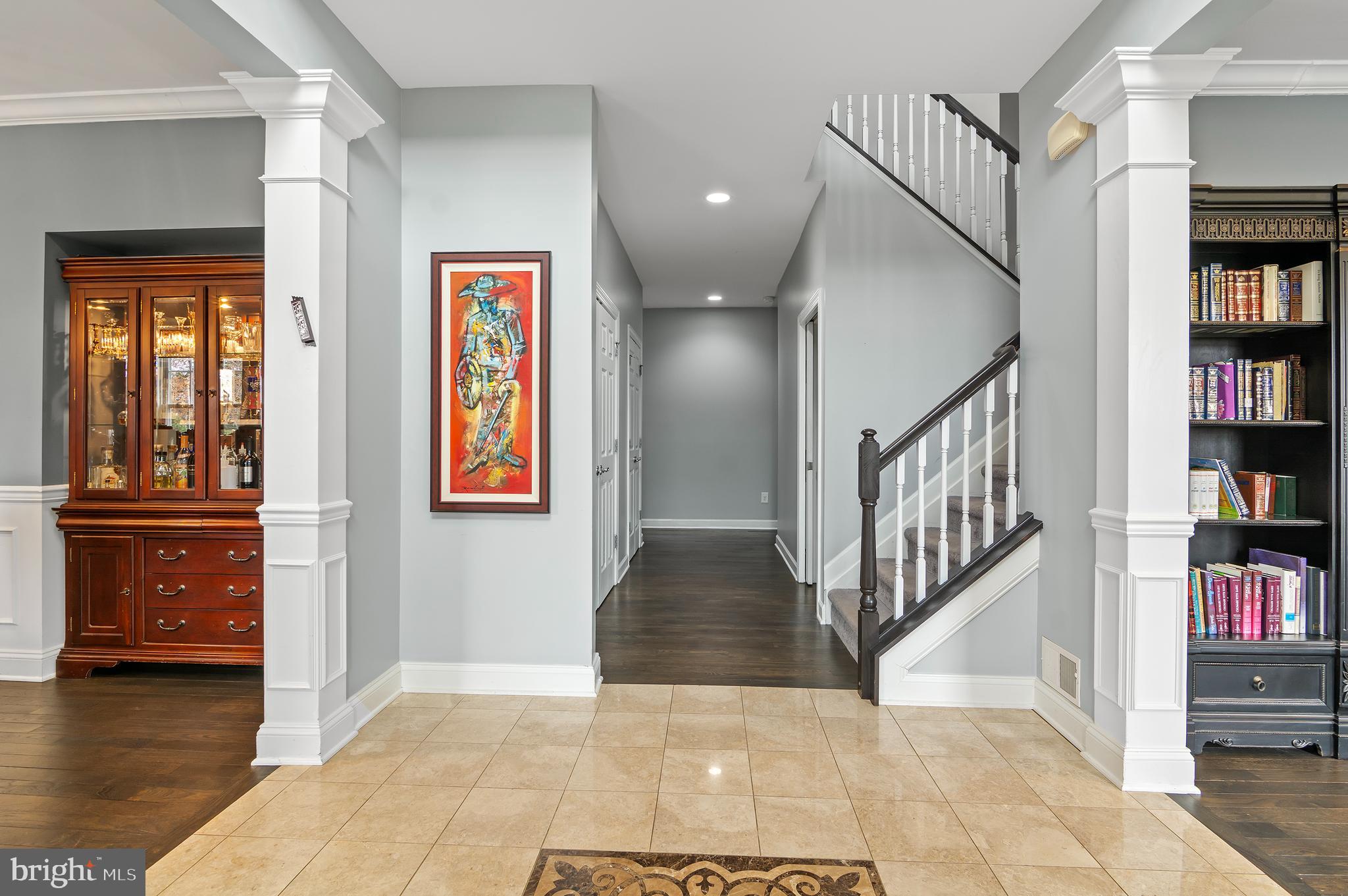 3211 Hatton Road Baltimore, MD 21208 - Photo 3 of 47 a view of a hallway with windows and entryway in a room