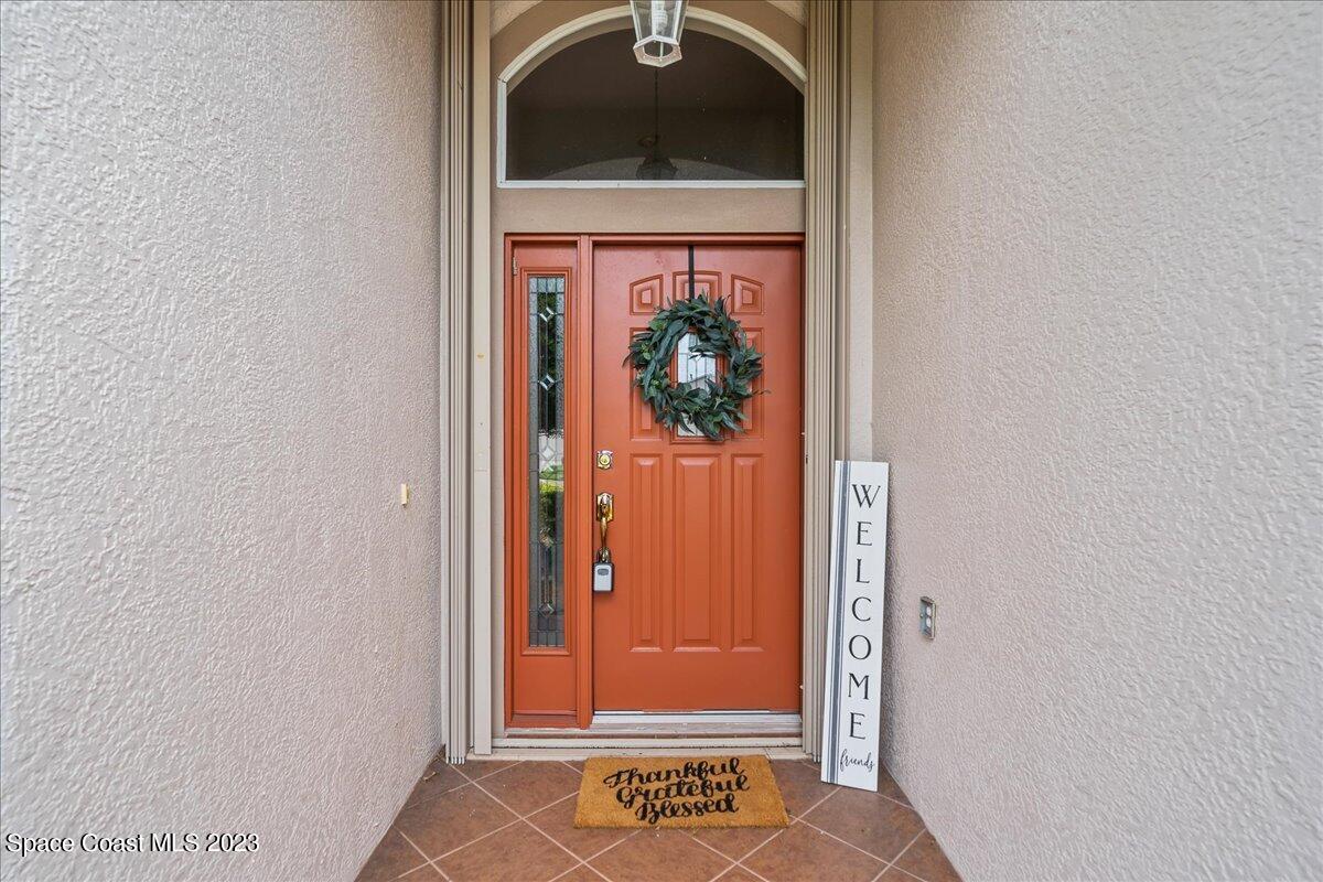1643 Keys Gate Drive Melbourne, FL 32940 - Photo 3 of 43 a door with a door
