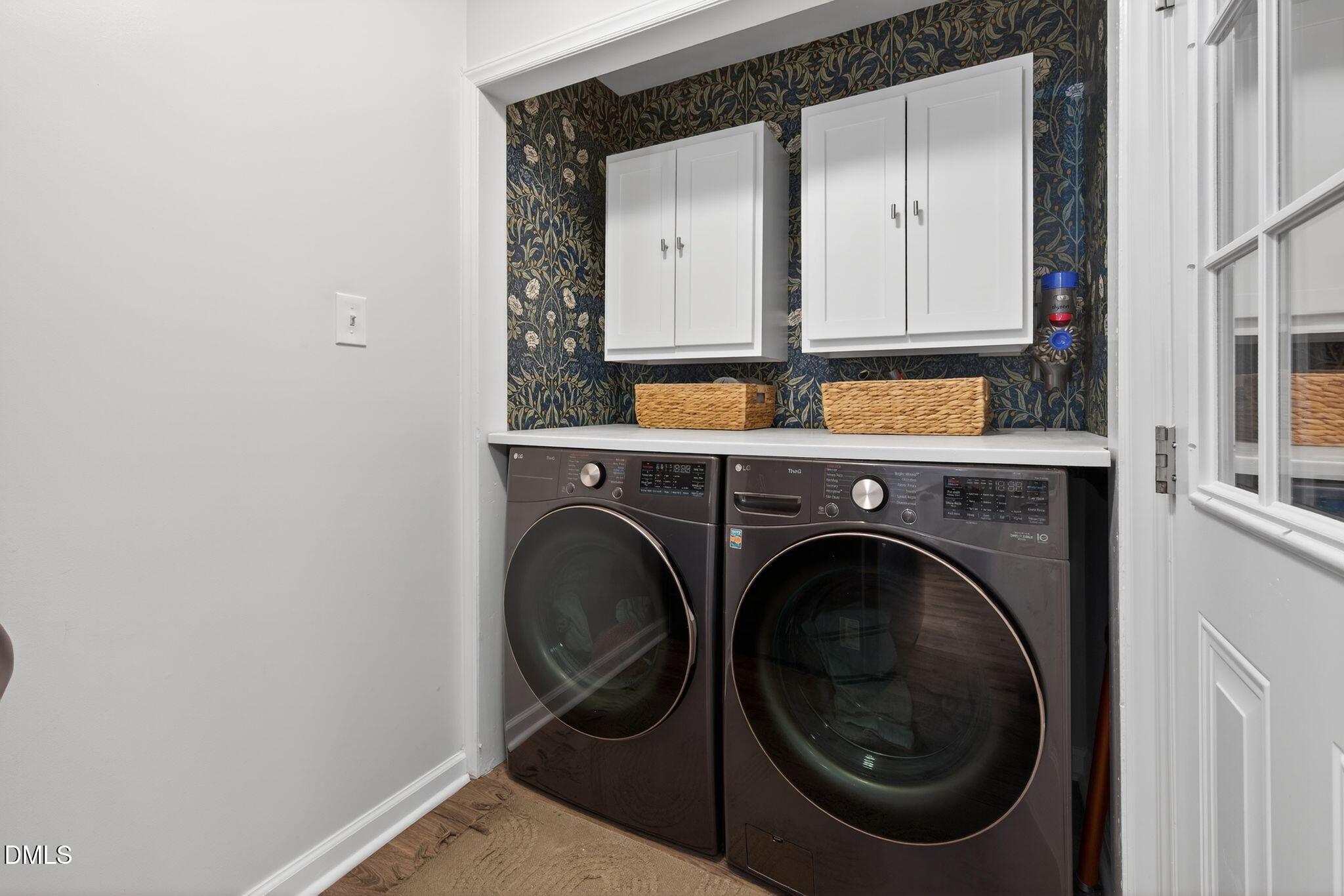 5620 Old Forge Circle Raleigh, NC 27609 - Photo 25 of 46 a view of a hallway with washer and dryer