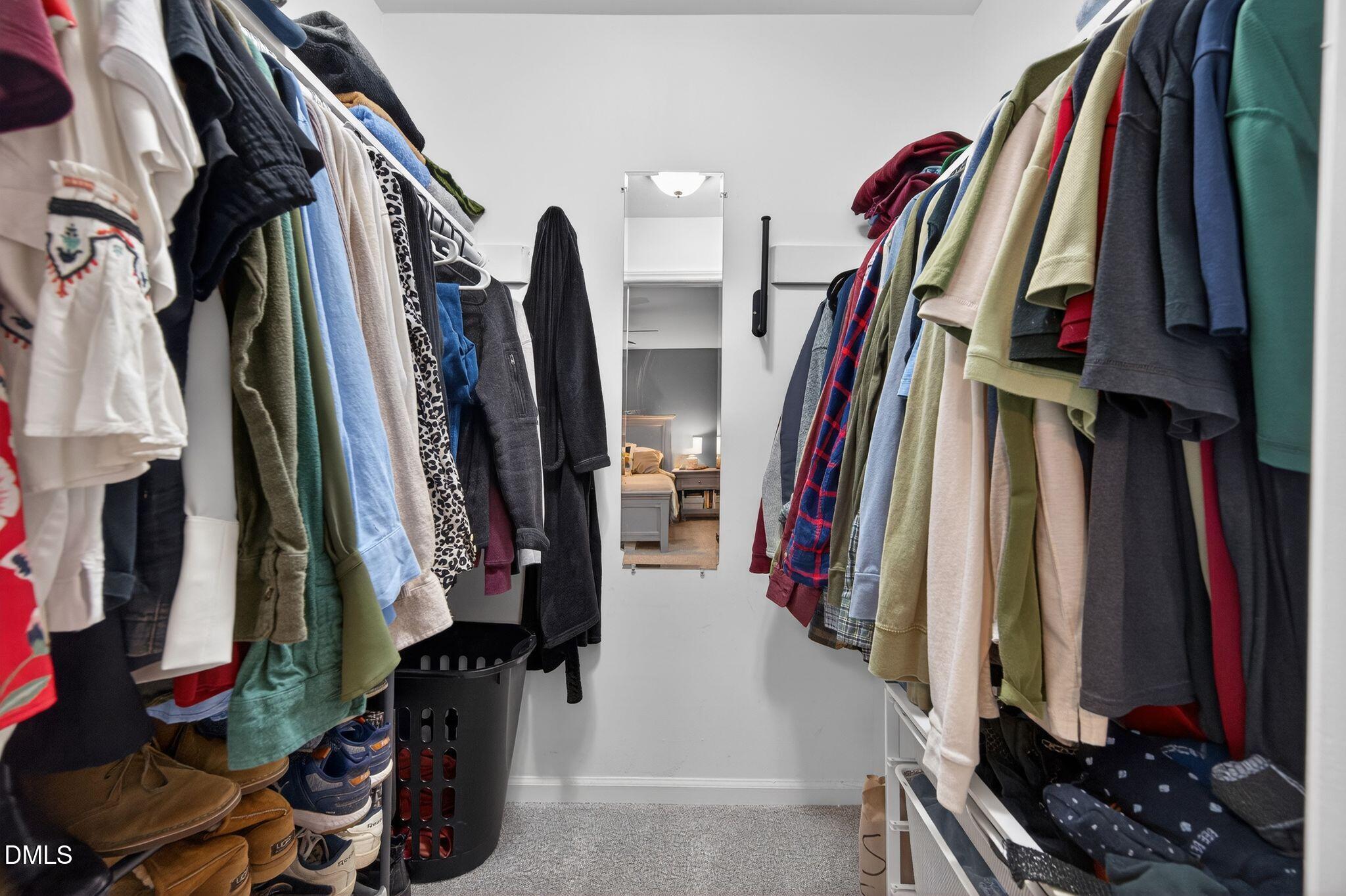 5620 Old Forge Circle Raleigh, NC 27609 - Photo 35 of 46 a view of walk in closet with clothes