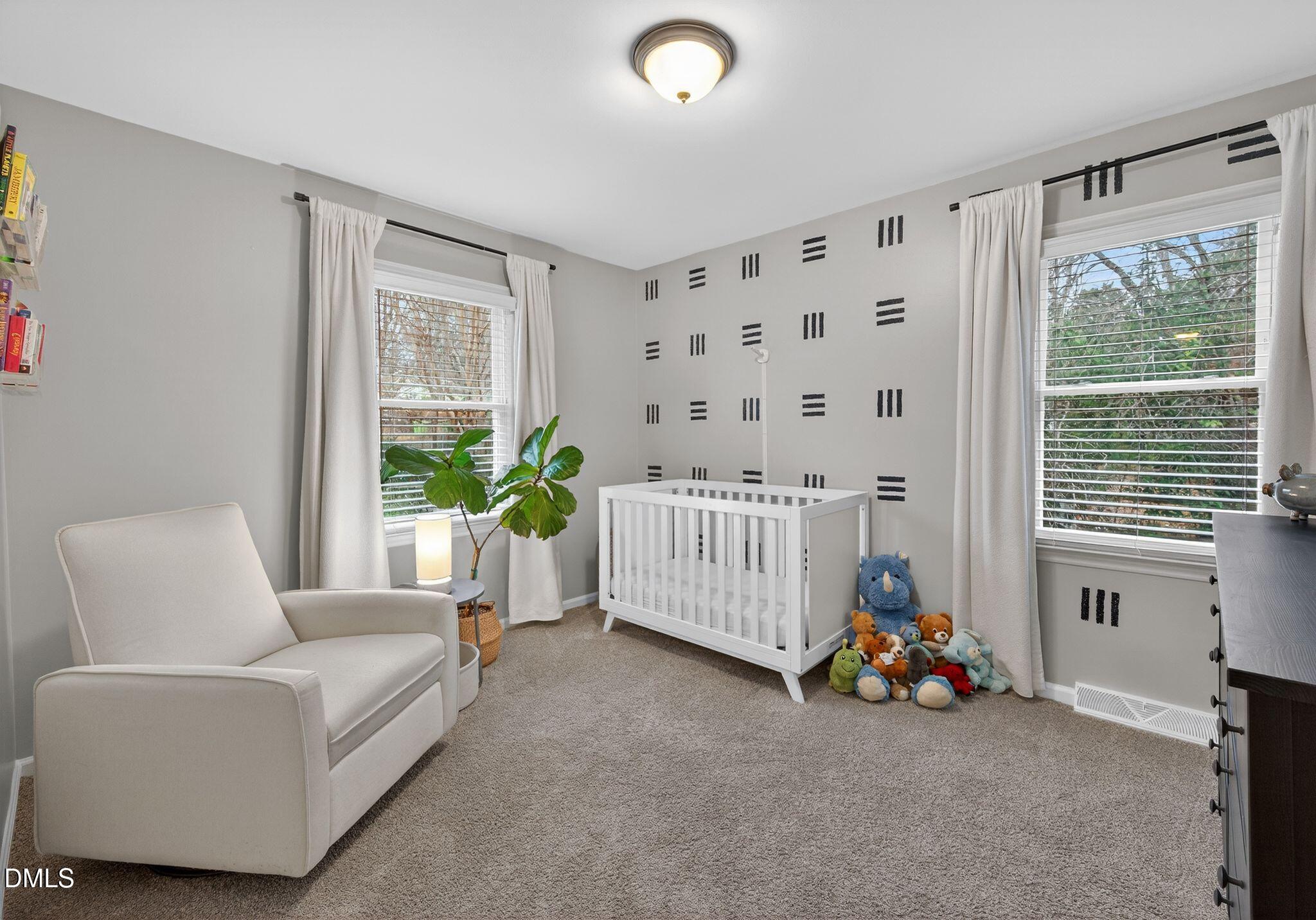 5620 Old Forge Circle Raleigh, NC 27609 - Photo 39 of 46 a bedroom with furniture and a window