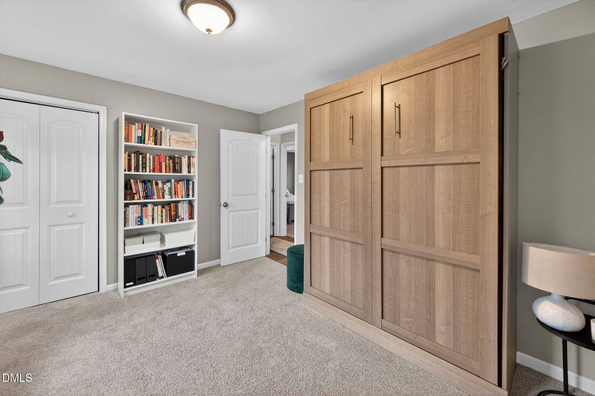 5620 Old Forge Circle Raleigh, NC 27609 - Photo 42 of 46 a view of a storage & utility room with refrigerator