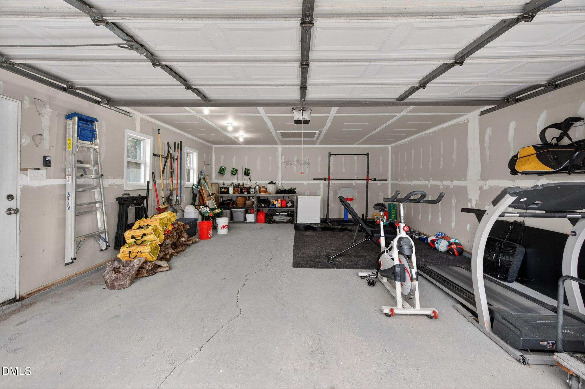 5620 Old Forge Circle Raleigh, NC 27609 - Photo 44 of 46 a view of a storage room with gym equipment