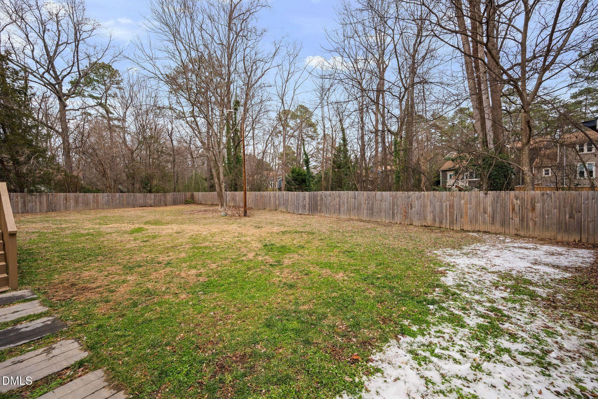 5620 Old Forge Circle Raleigh, NC 27609 - Photo 5 of 46 a view of outdoor space with deck and tree