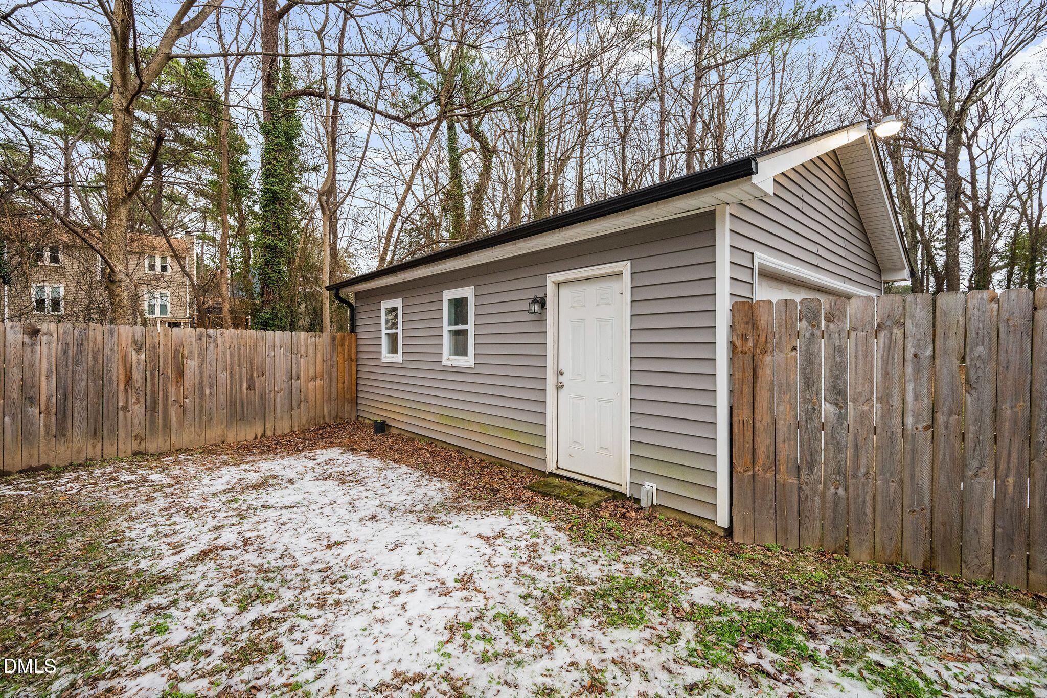 5620 Old Forge Circle Raleigh, NC 27609 - Photo 6 of 46 a backyard of a house