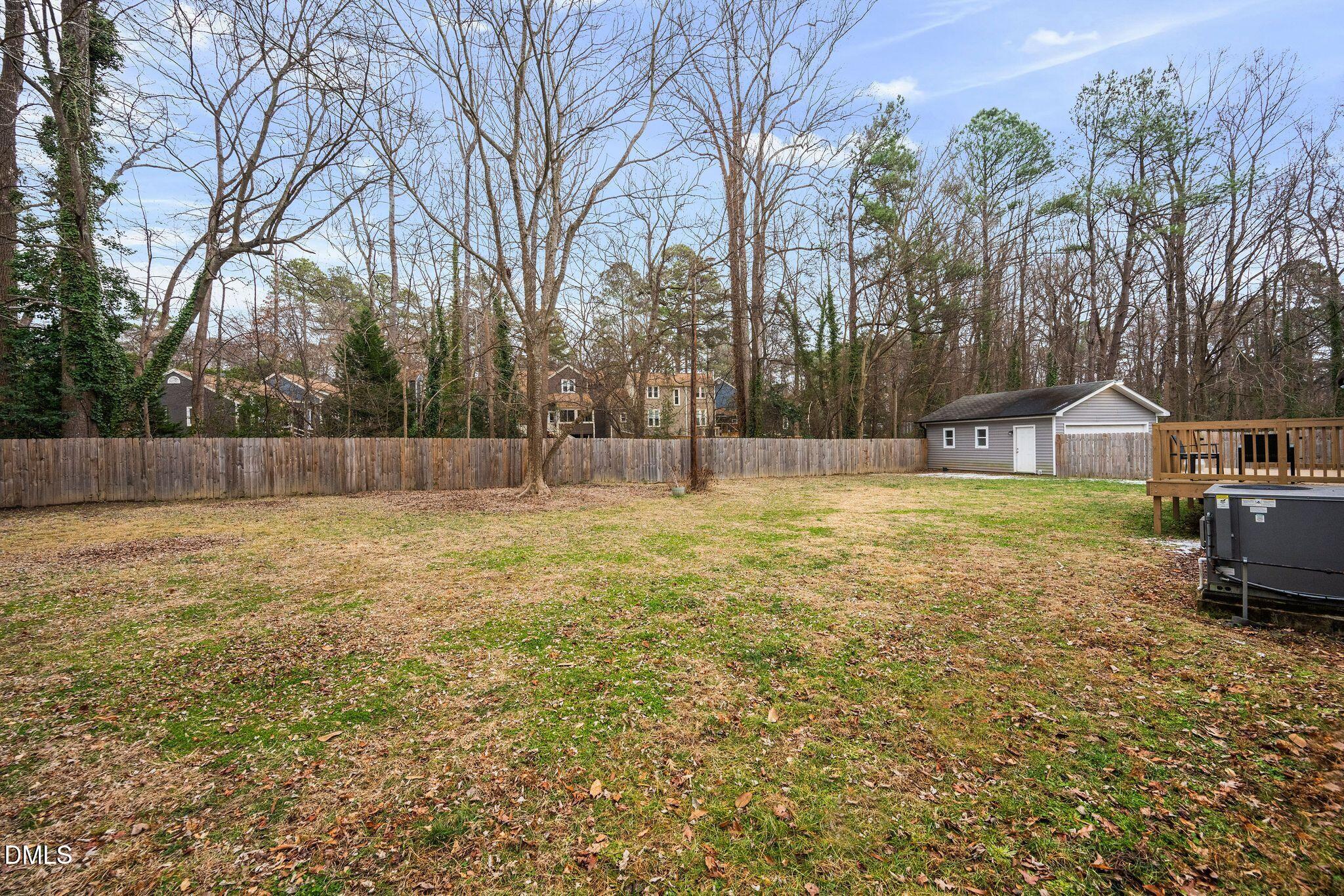 5620 Old Forge Circle Raleigh, NC 27609 - Photo 7 of 46 a view of outdoor space with swimming pool and trees