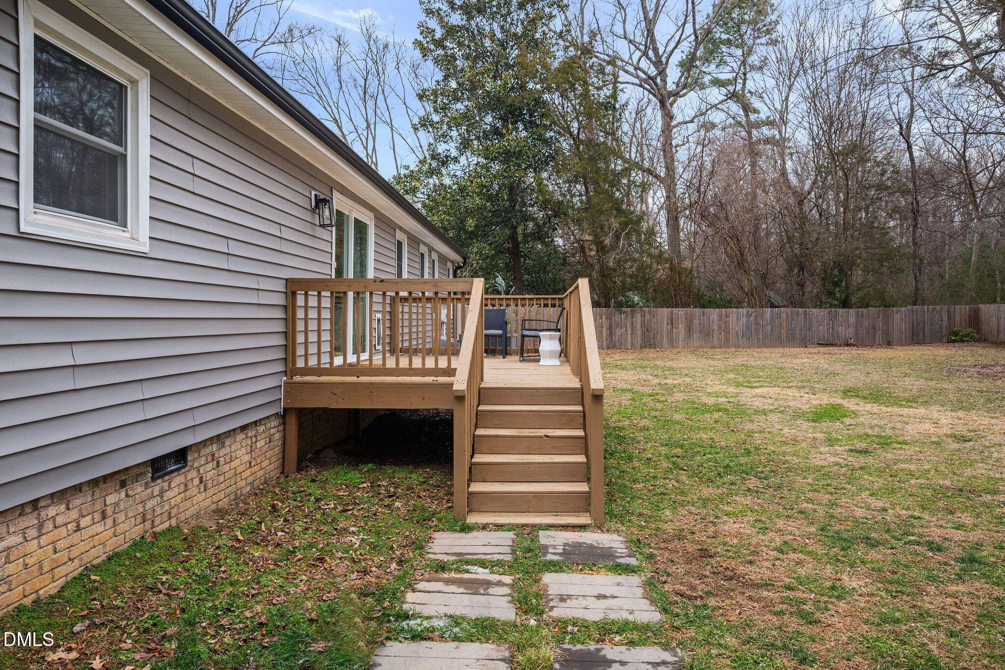 5620 Old Forge Circle Raleigh, NC 27609 - Photo 9 of 46 a view of a house with a yard