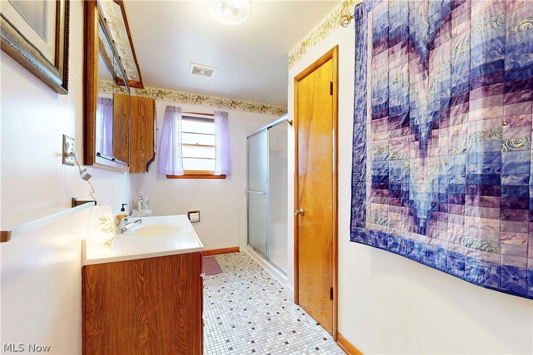 391 Canton Road Steubenville, OH 43953 - Photo 23 of 40 Full bath featuring a stall shower and vanity