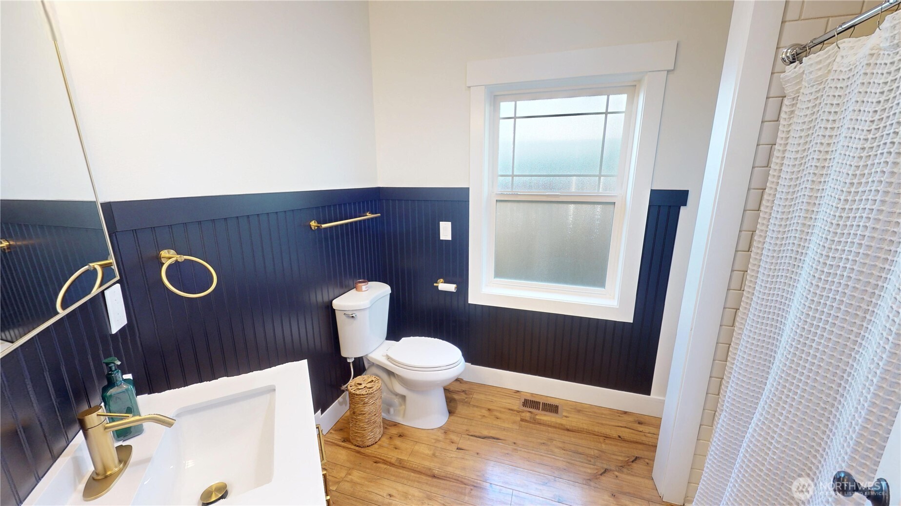 116 Alameda Avenue Fircrest, WA 98466 - Photo 14 of 33 a bathroom with a toilet and a sink