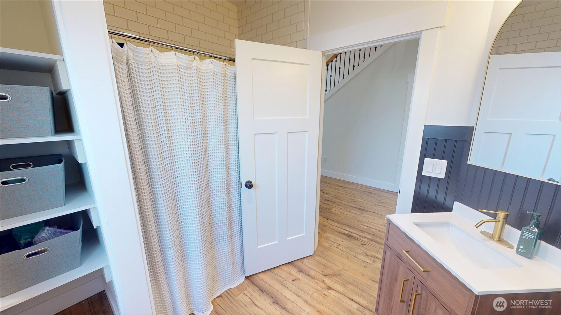 116 Alameda Avenue Fircrest, WA 98466 - Photo 15 of 33 a bathroom with a sink a mirror and shower
