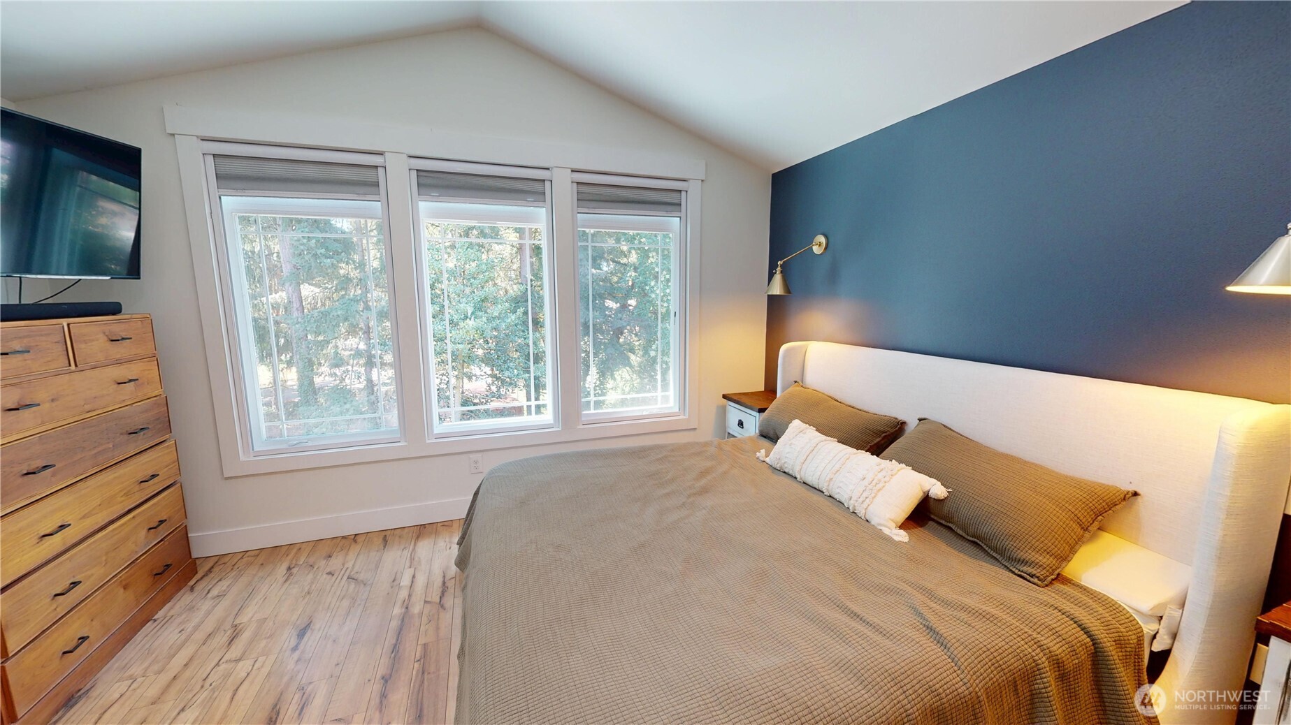 116 Alameda Avenue Fircrest, WA 98466 - Photo 17 of 33 a bed sitting in a bedroom next to a window