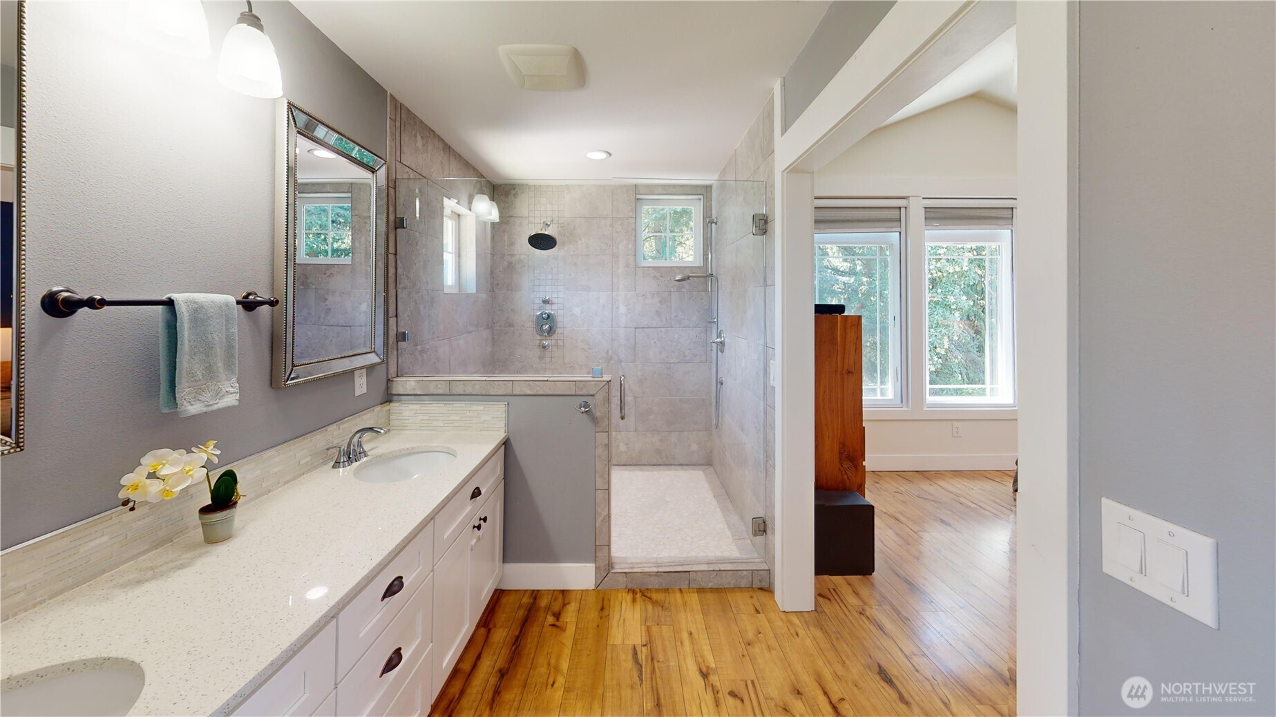116 Alameda Avenue Fircrest, WA 98466 - Photo 20 of 33 a spacious bathroom with a granite countertop tub a sink and a large mirror