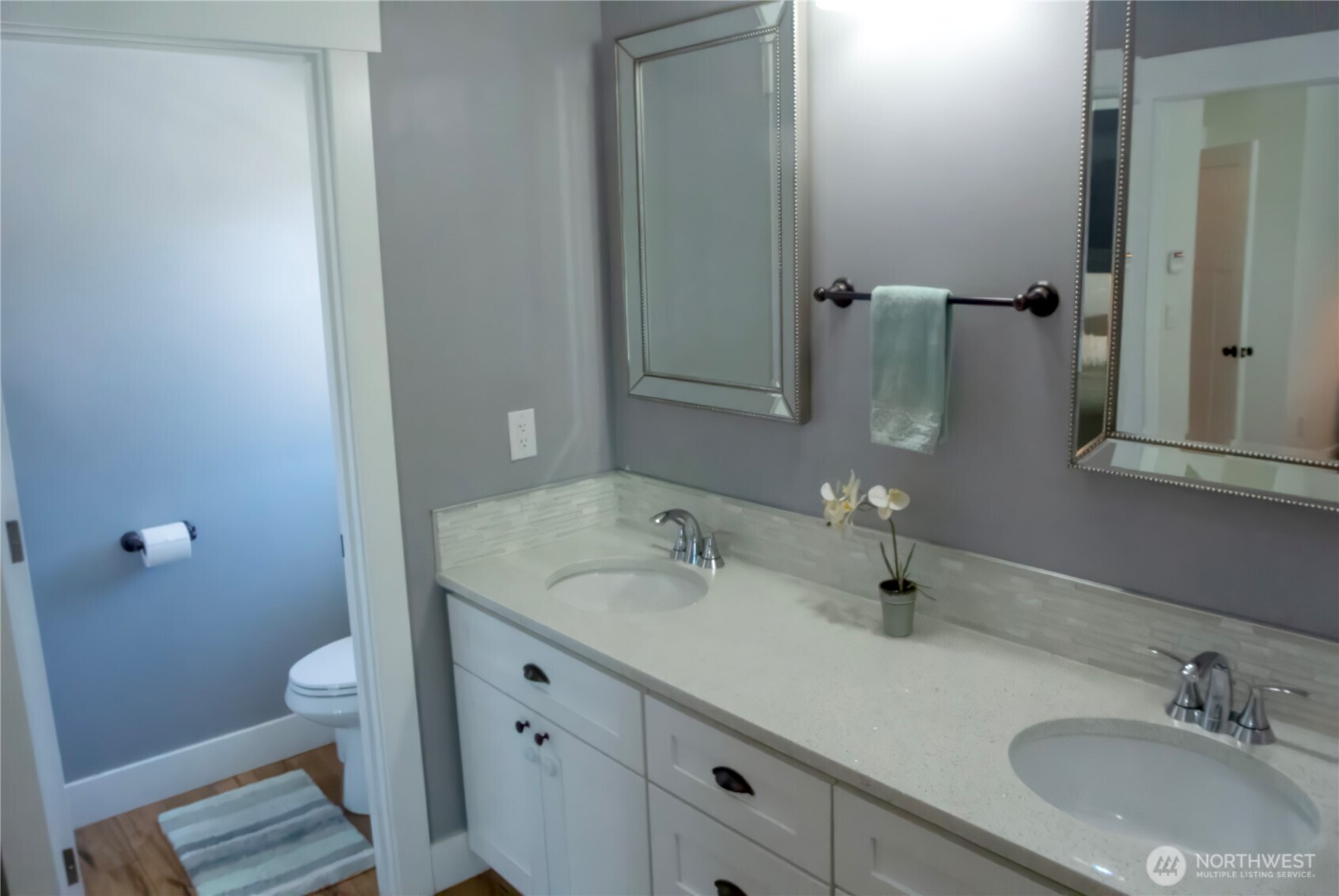 116 Alameda Avenue Fircrest, WA 98466 - Photo 23 of 33 a bathroom with a sink and a mirror with toilet