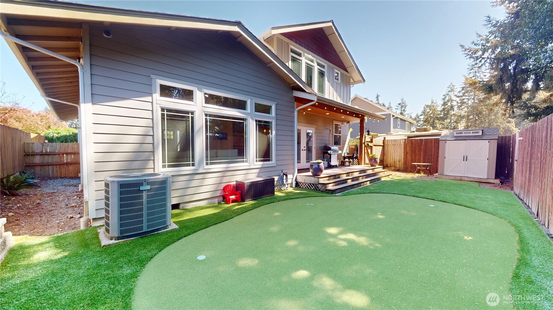 116 Alameda Avenue Fircrest, WA 98466 - Photo 29 of 33 a view of a house with backyard porch and sitting area