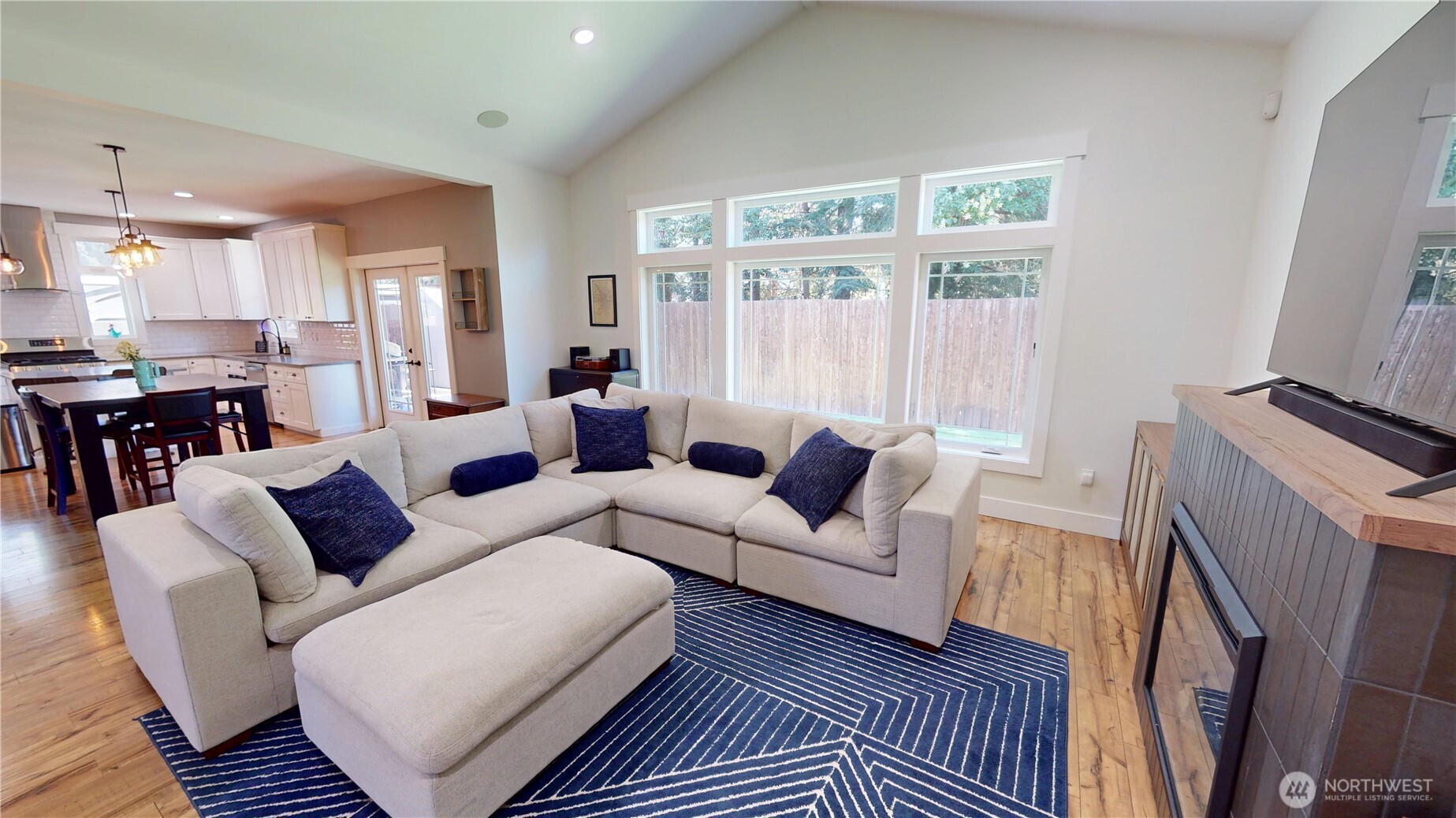 116 Alameda Avenue Fircrest, WA 98466 - Photo 6 of 33 a living room with furniture and a flat screen tv