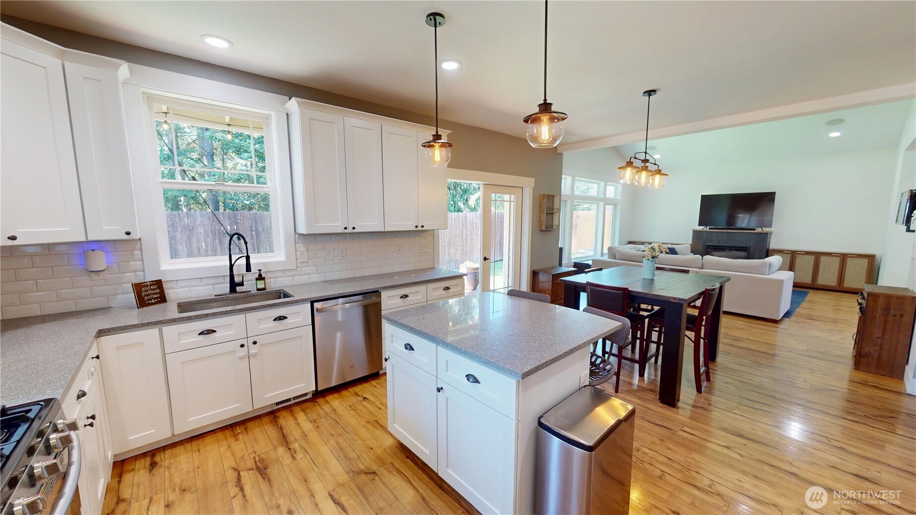 116 Alameda Avenue Fircrest, WA 98466 - Photo 9 of 33 a large kitchen with kitchen island a large island in it