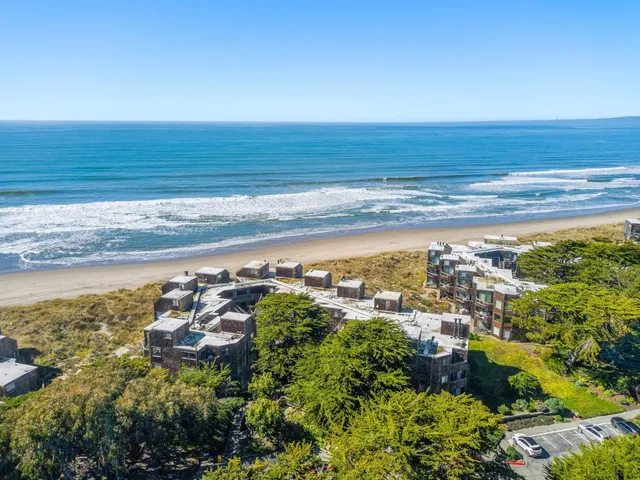 a view of a ocean with a beach