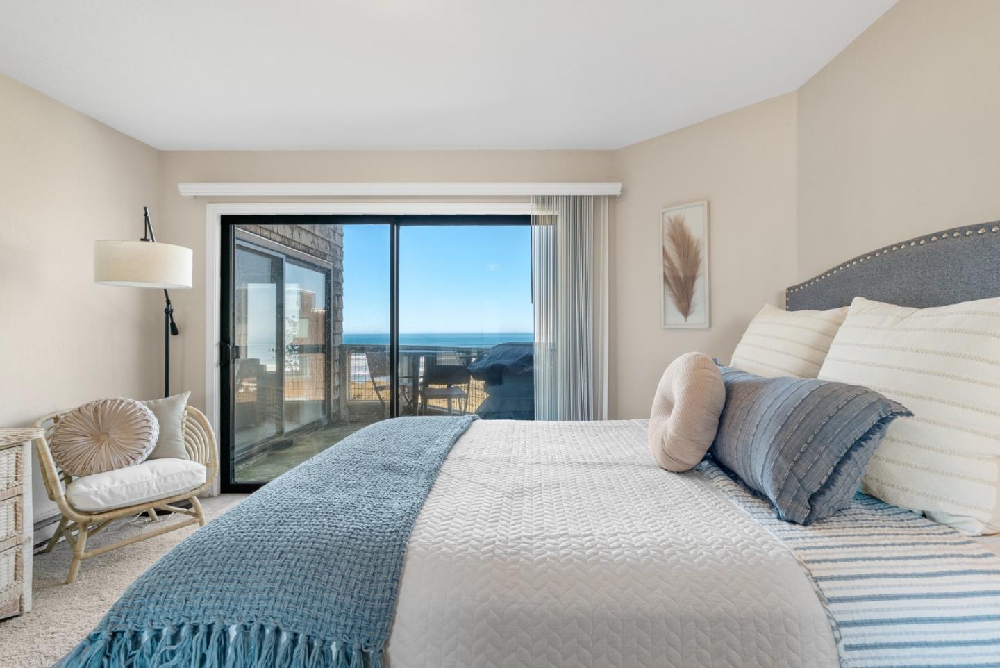 101 Shell Road, Unit 64 Watsonville, CA 95076 - Photo 21 of 35 a bedroom with a bed and a couch