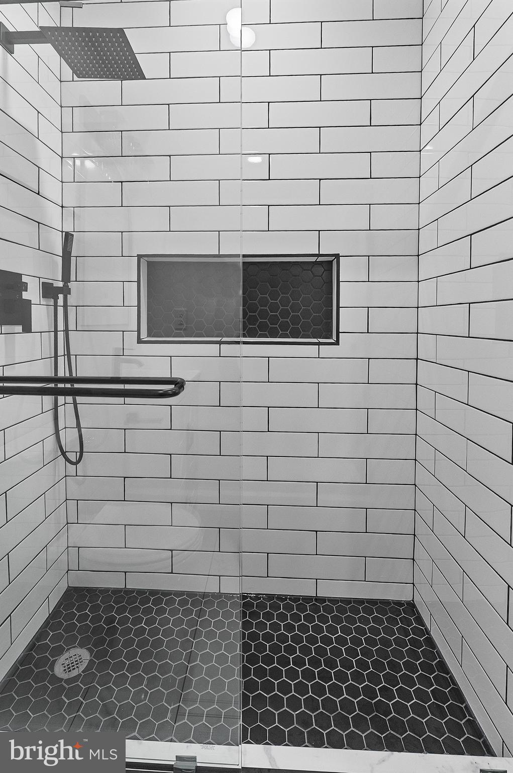 323 South Stricker Street Baltimore, MD 21223 - Photo 15 of 39 a bathroom with a shower