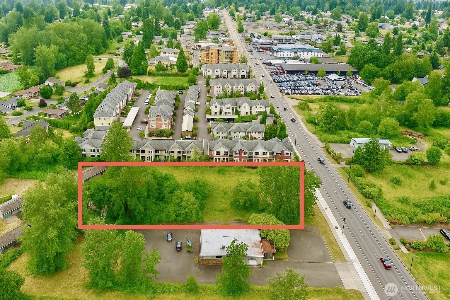 2513 Meridian Avenue East Edgewood, WA 98371 - Photo 5 of 8 a view of building and outdoor space
