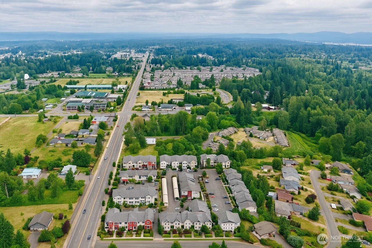 2513 Meridian Avenue East Edgewood, WA 98371 - Photo 7 of 8 an aerial view of multiple house