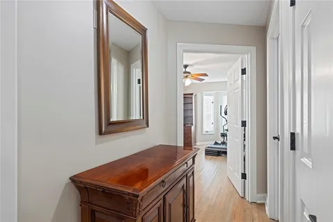 a view of a livingroom with workspace and a window