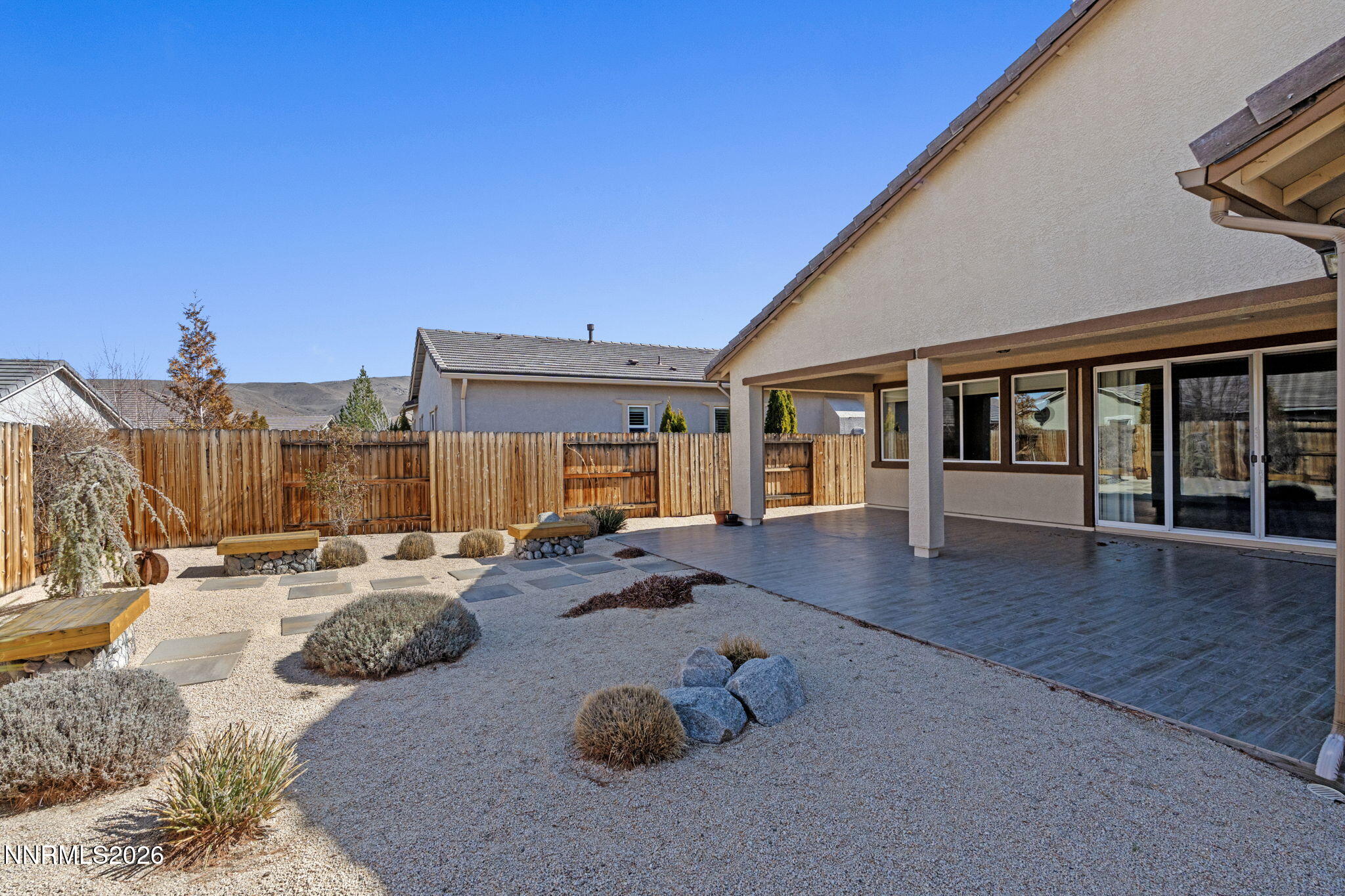 9785 Hafflinger Lane Reno, NV 89521 - Photo 32 of 34 a view of a house with swimming pool and sitting area