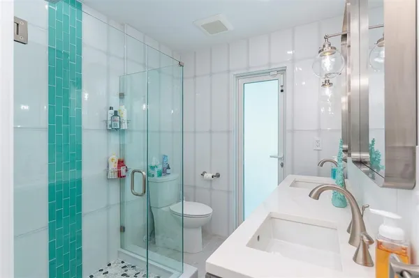 a spacious bedroom with a bed and a table