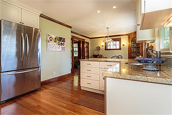36 Argyle Road Arlington, MA 02476 - Photo 13 of 26 a kitchen with stainless steel appliances granite countertop a refrigerator sink and cabinets